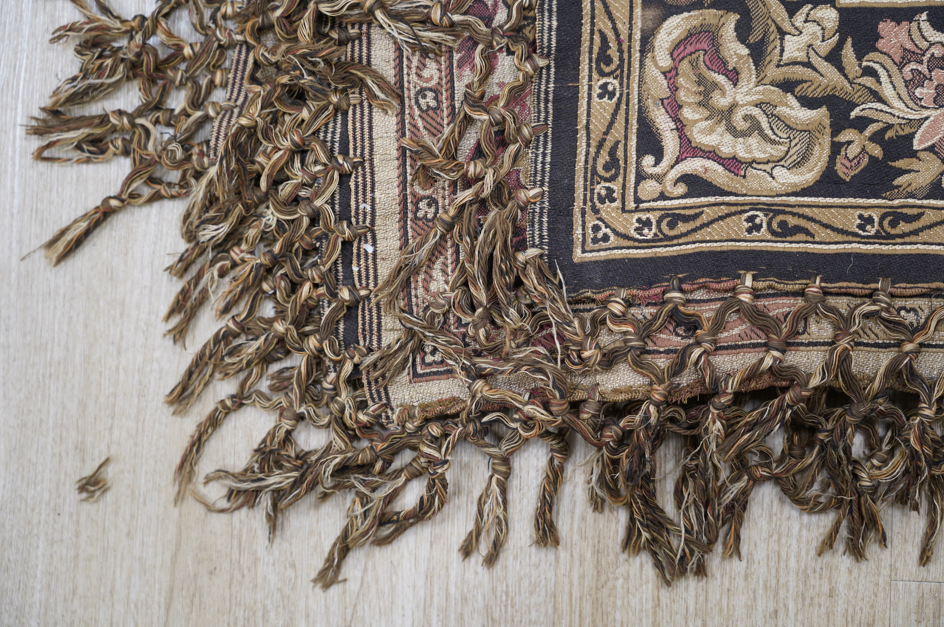 A Belgian Arabic style machine made throw depicting a hunting scene. Condition - fair to good